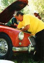 Changing water pump in campground, Cache Creek, British Columbia, Canada