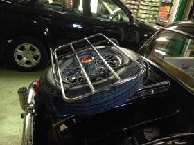 Luggage carrier with tire rack added