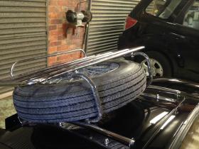 Luggage carrier with tire rack added