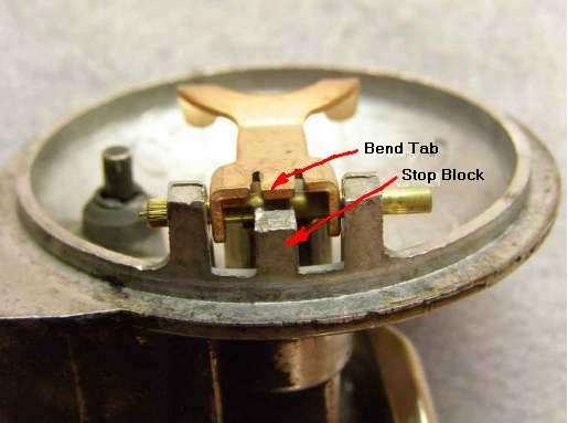 float arm slots for bending a tab